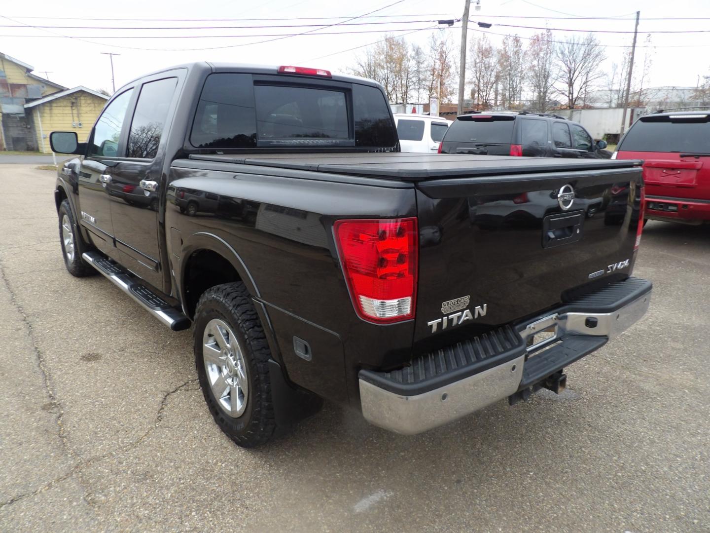 2015 Nissan Titan S Crew Cab 4WD (1N6BA0EC7FN) with an 5.6L V8 DOHC 32V FFV engine, 5-Speed Automatic transmission, located at 401 First NE, Bearden, AR, 71720, (870) 687-3414, 33.726528, -92.611519 - Photo#2